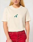A woman wearing a City to Ocean T-shirt with 'City to Ocean' logo design on the front. 100% Cotton in natural raw white, untreated sustainable fabric