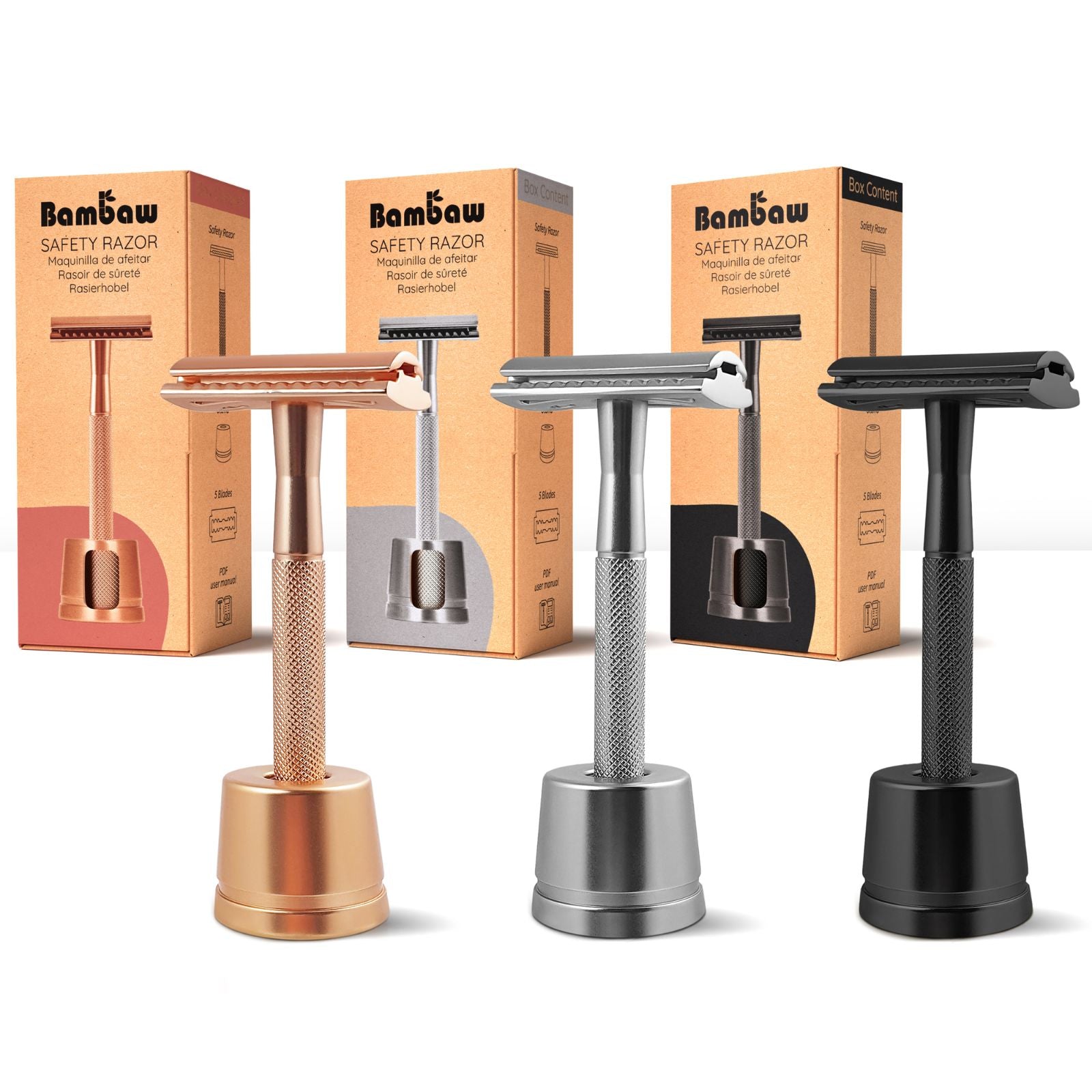 Three Bambaw safety razors with stands in different colors with their packaging on a white background