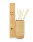Six cotton straw cleaning brushes with twisted metal handles in a bamboo holder beside the brown box.